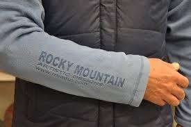 A branded sweater sleeve saying "Rocky Mountain."